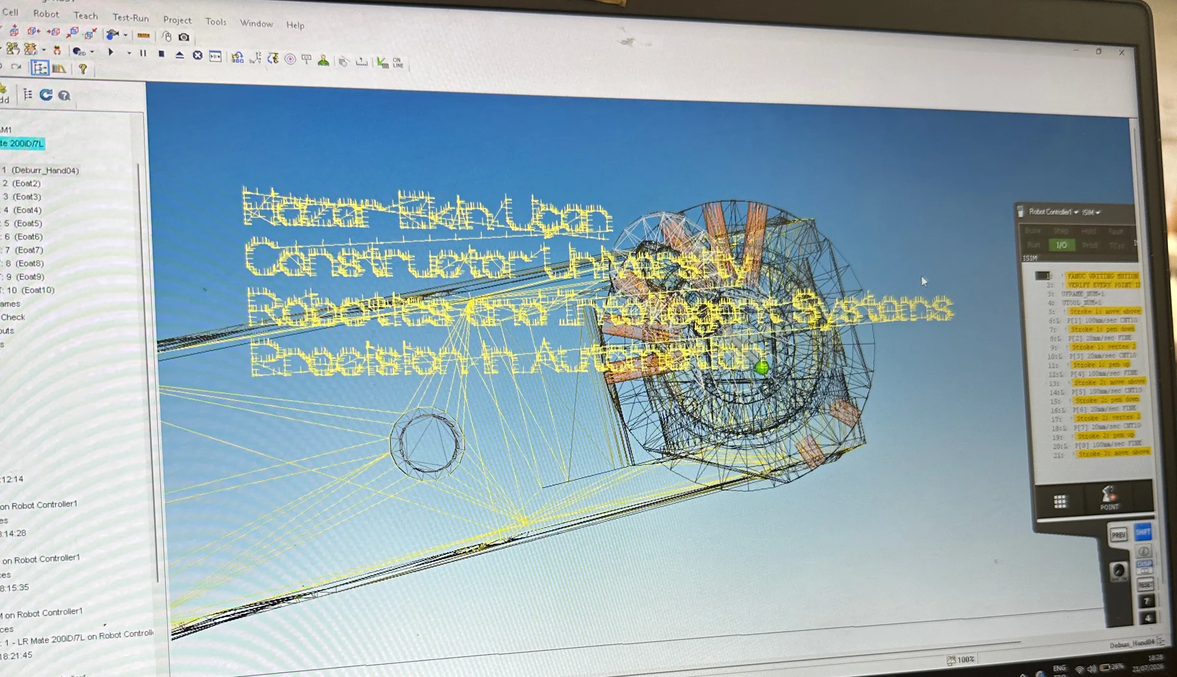 RoboGuide showing the generated toolpath as four lines of yellow text positioned in front of the robot model in the simulated cell.